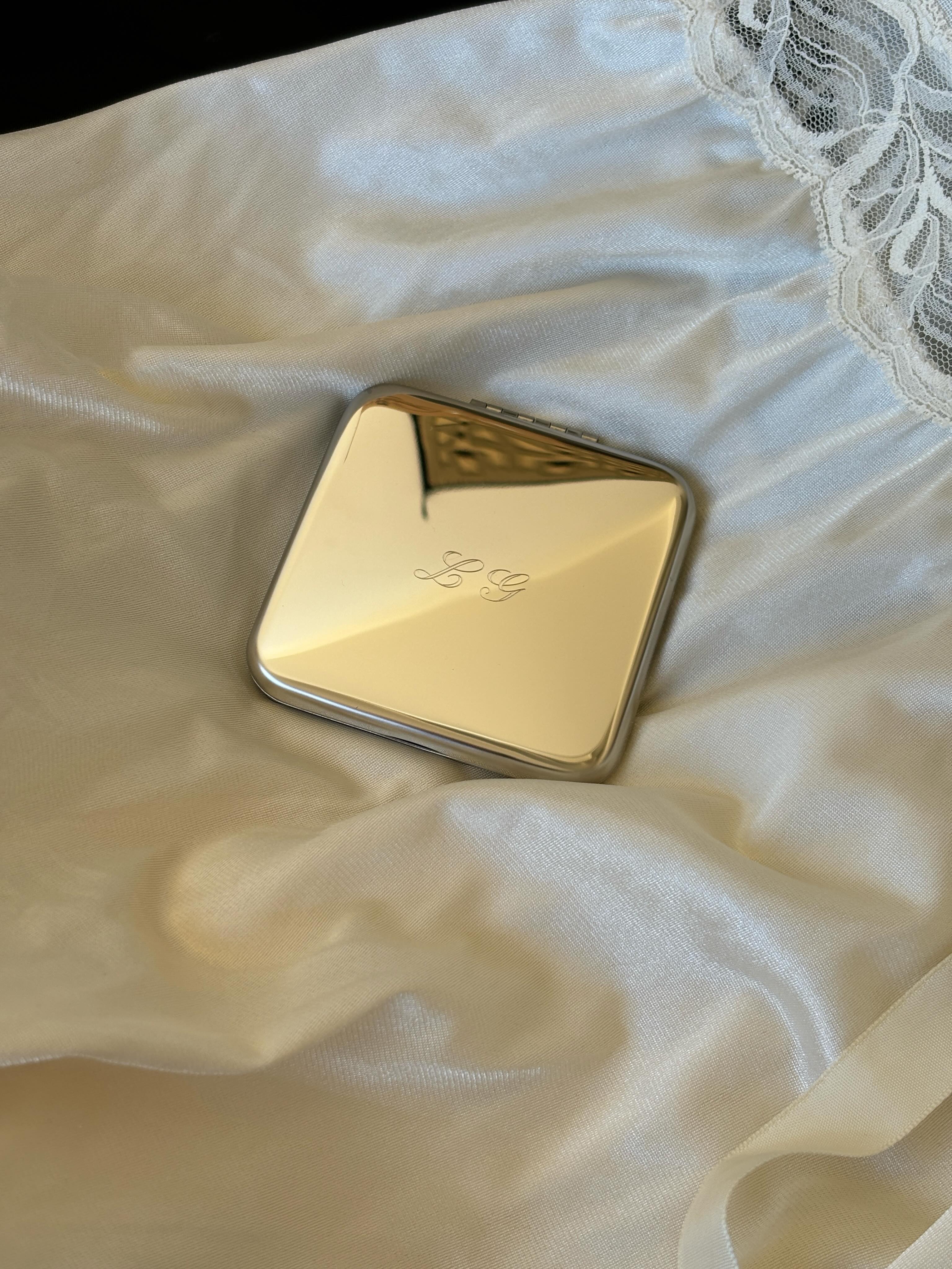 COMPACT MIRROR